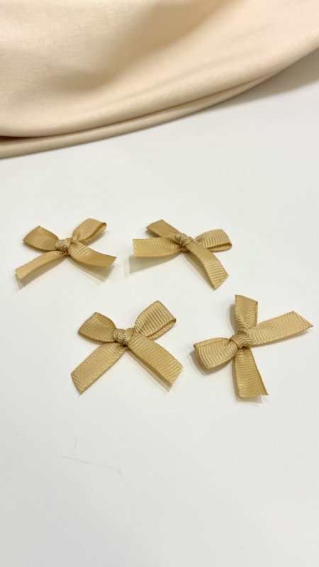 ببينونة قماش محزز ( ذهبي )  عرض 1 سم